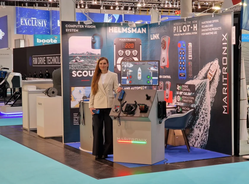 Maritronix exhibition stand at boot Düsseldorf 2025, showing PILOT-H wireless yacht control, SCOUT AI, Helmsman, and Rudder Link marine electronics systems