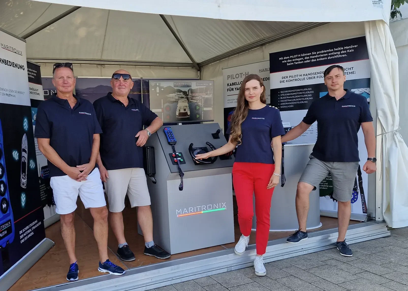 Maritronix exhibition stand at BOOT & FUN INWATER 2024 in Werder, showing the PILOT-H wireless yacht control system
